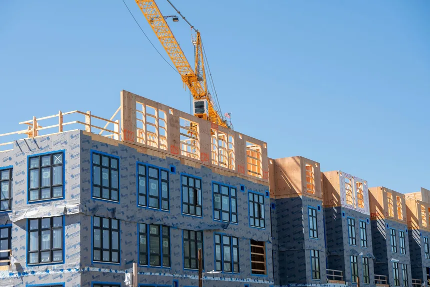 Multifamily framing under a tower crane